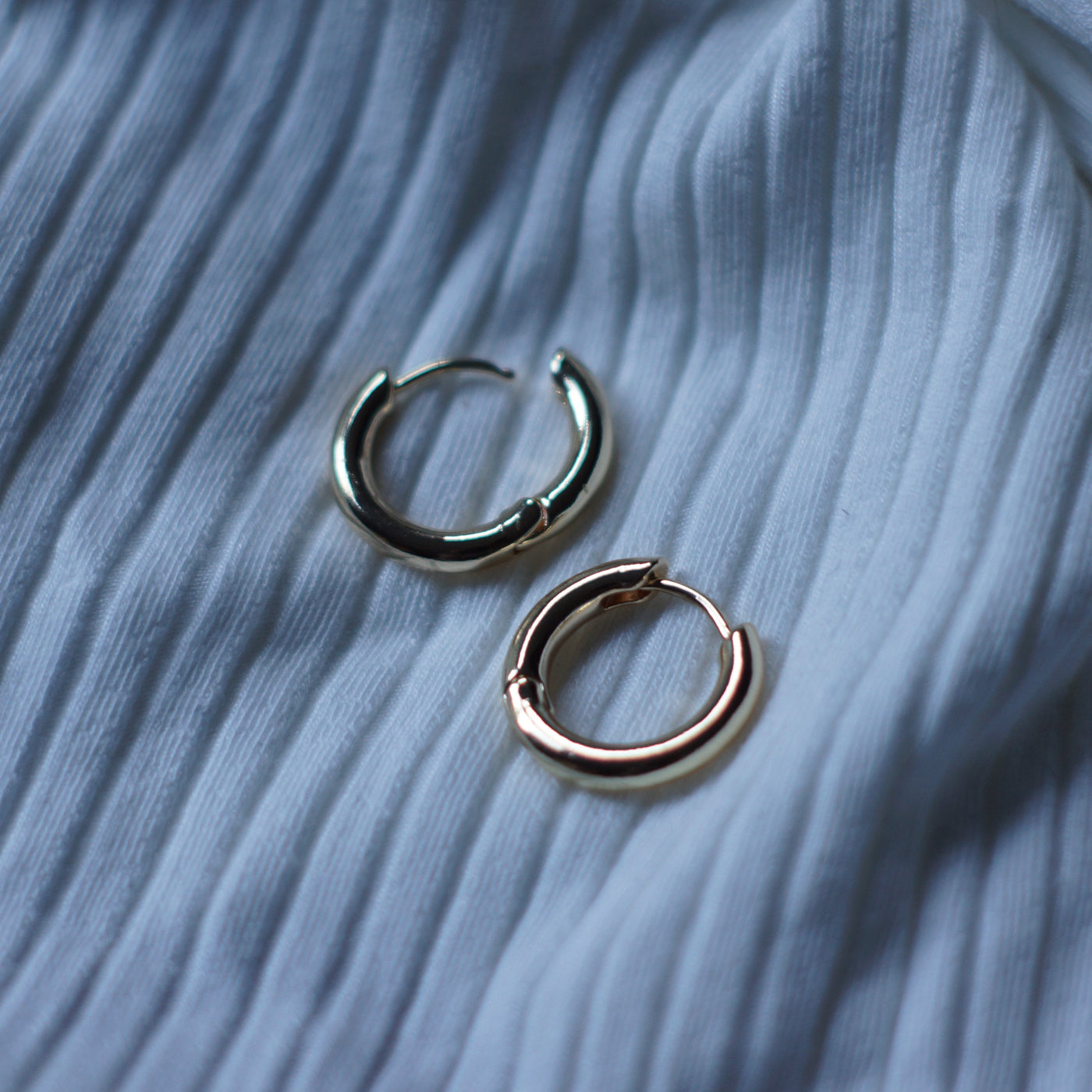 Round gold hoop earrings