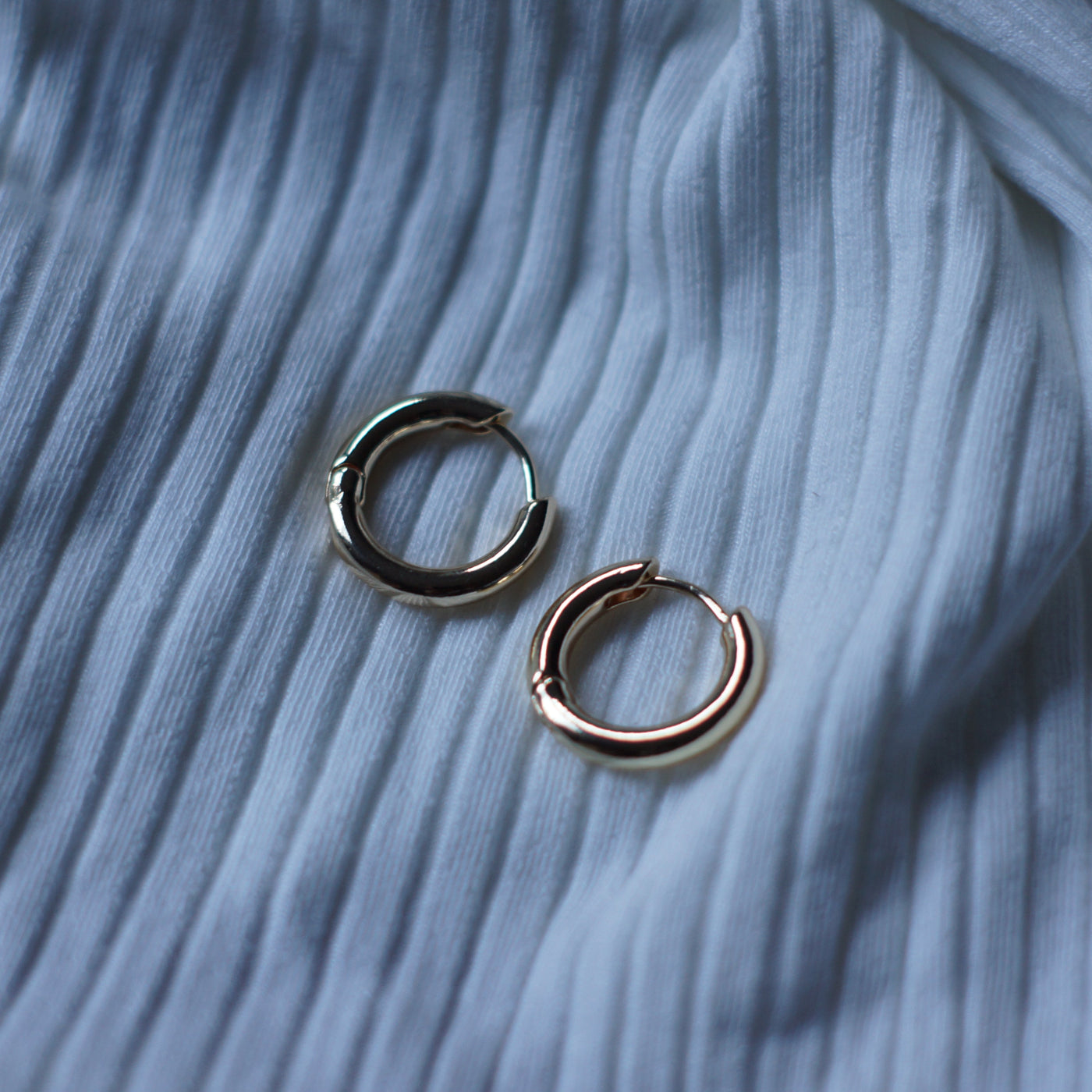 Round gold hoop earrings